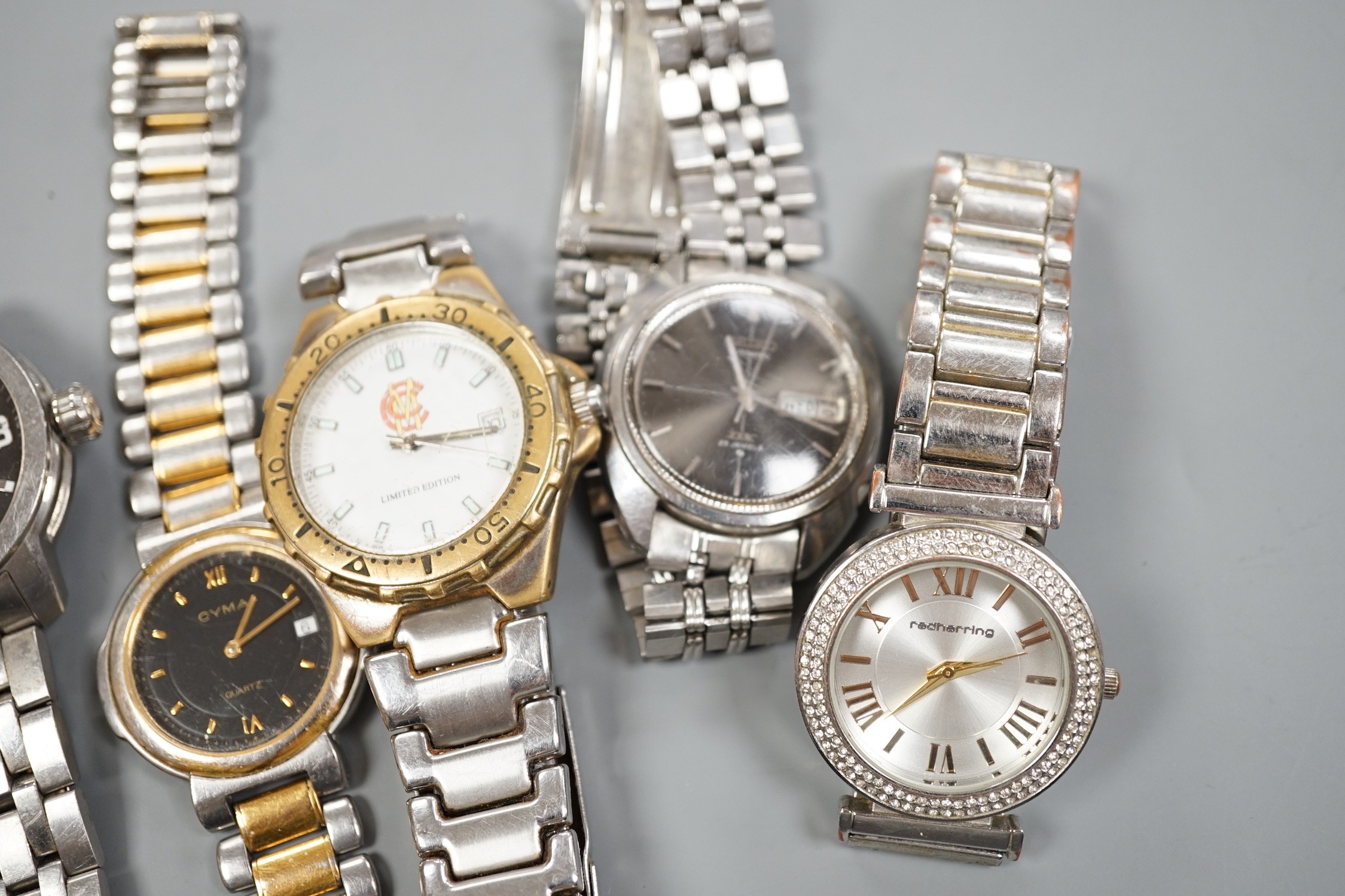 Six assorted gentleman's modern wrist watches including Seiko, Tissot and Cyma.